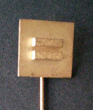 Ehrennadel  mit dem Symbol des Paritätischen
